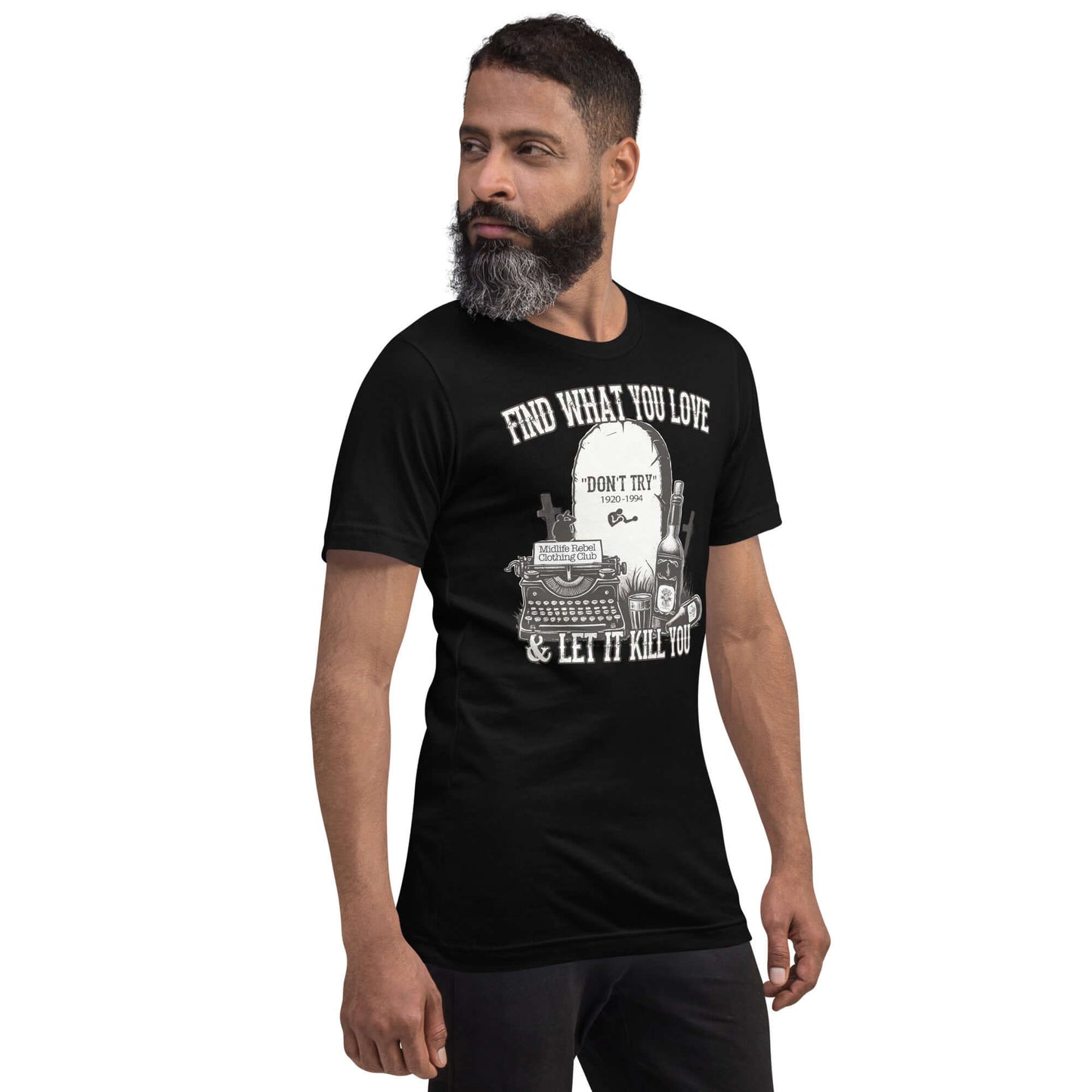 Man wearing "Find What You Love & Let It Kill You" shirt from Midlife Rebel Bukowski Collection, featuring tombstone and typewriter design.
