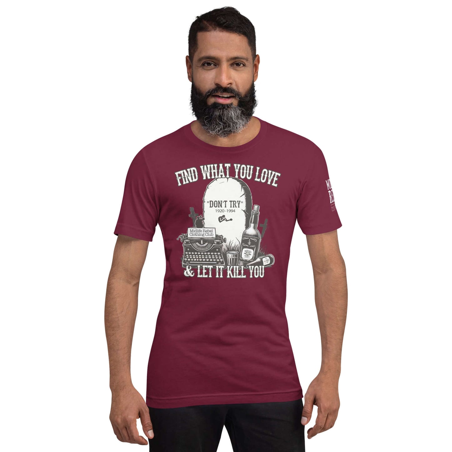 Man wearing a "Find What You Love & Let It Kill You" shirt from Midlife Rebel Bukowski Collection with tombstone and typewriter design.