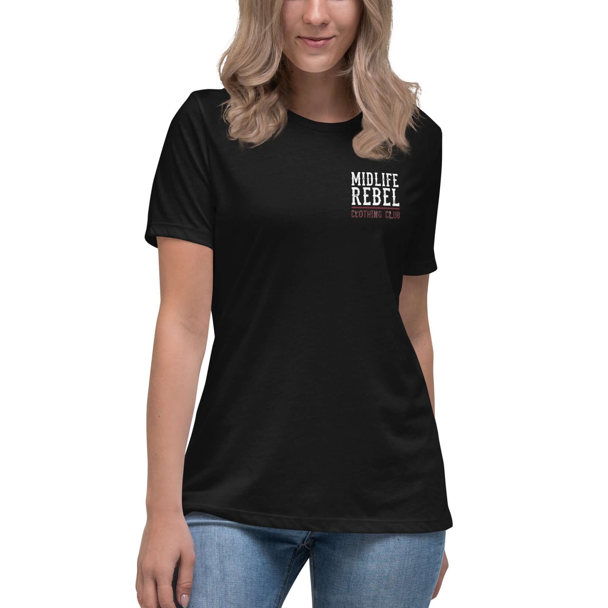 Woman wearing black "Midlife Rebel" relaxed T-shirt, promoting resilience and strength.