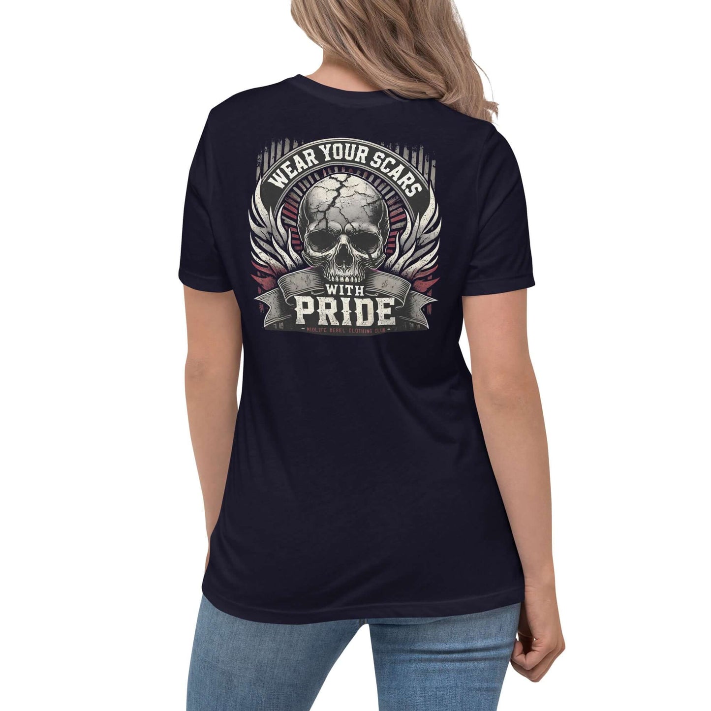 Woman wearing Midlife Rebel Women's Relaxed T-Shirt with "Wear Your Scars With Pride" skull design on the back, celebrating resilience.