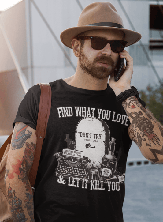 Midlife-Rebel-Clothing-Club-Find-What-You-Love-bearded-man-with-tattooed-arms-using-his-phone