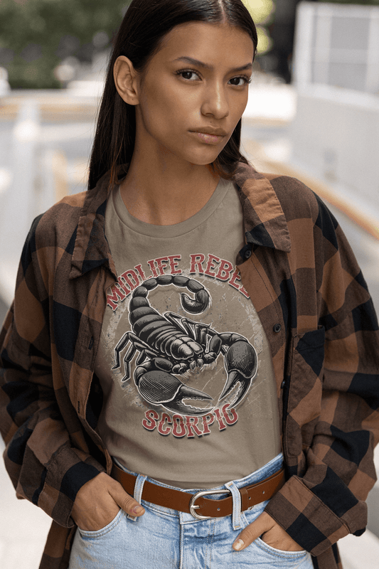 Woman wearing Scorpio Scorpion Zodiac T-shirt, Midlife Rebel design, astrology apparel, outdoors fashion