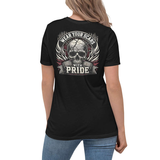 Woman wearing "Wear Your Scars With Pride" Midlife Rebel T-shirt with skull design, celebrating resilience and strength.