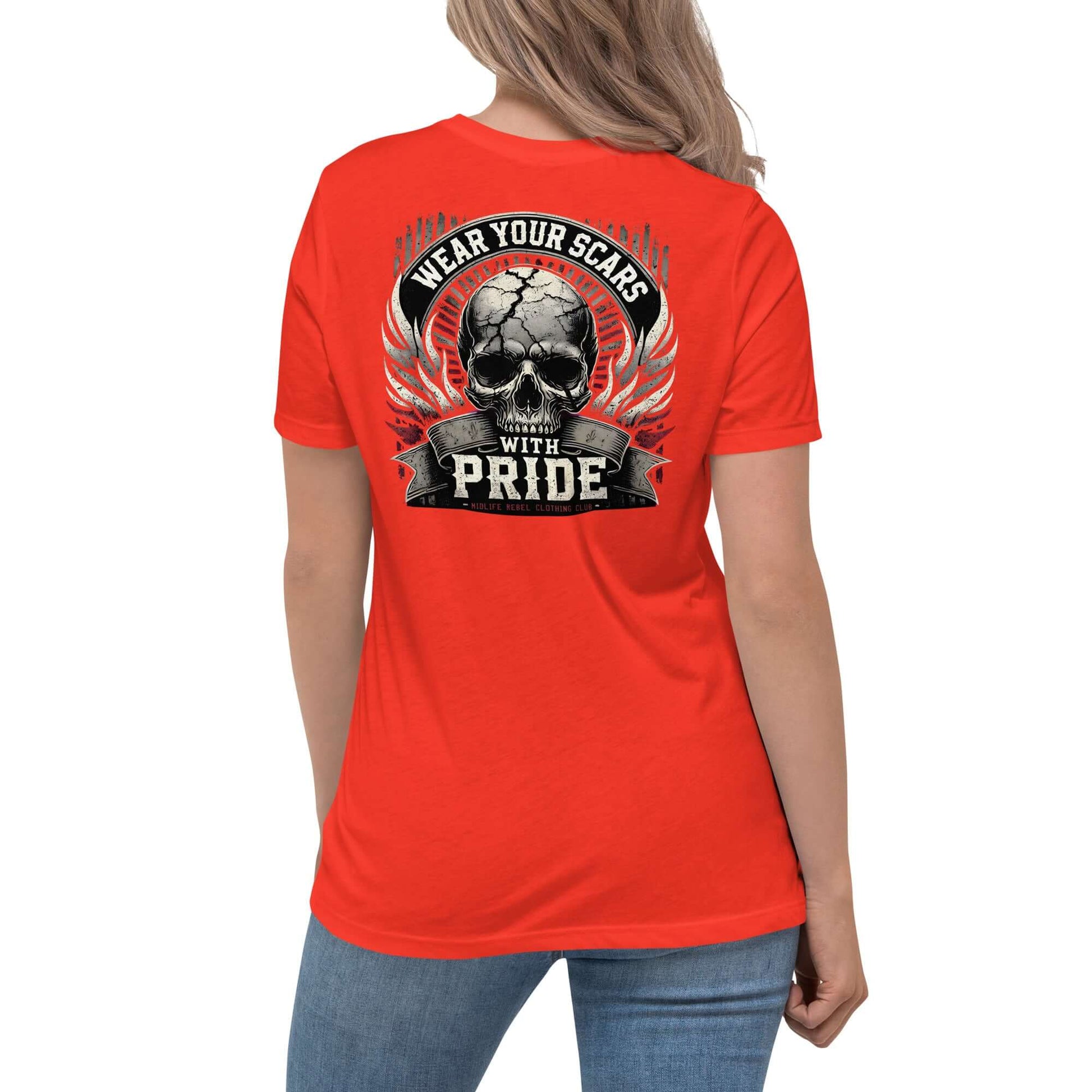 Red t-shirt with a skull design and "Wear Your Scars With Pride" slogan on the back, worn by woman in jeans.